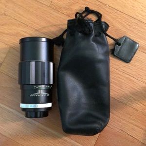 Soligor lens with leather case